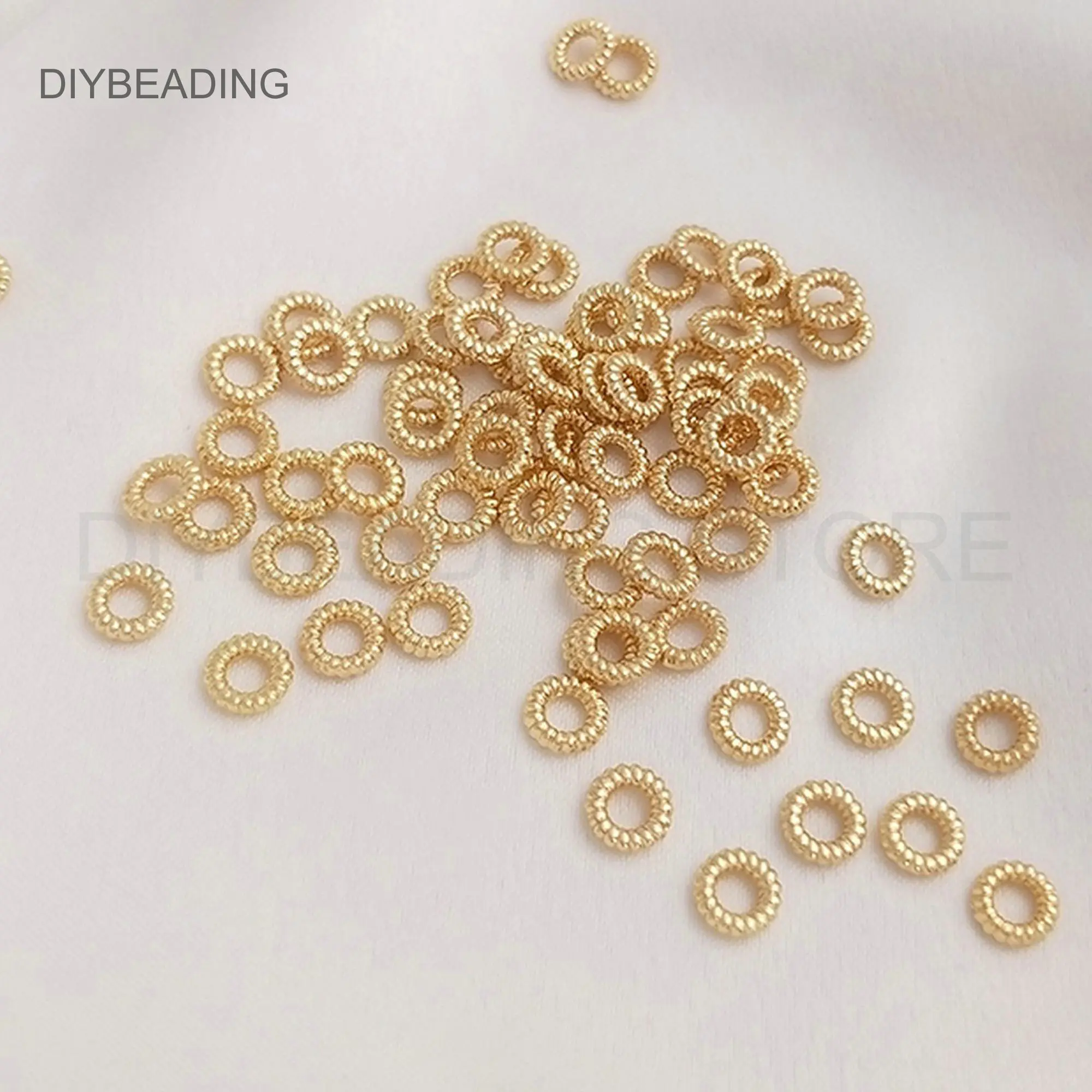 

Jump Rings for Jewelry Making Supplies 14K Gold Plated Brass Twisted Closed Mini Jumpring Connector Finding Wholesale (4.5mm)