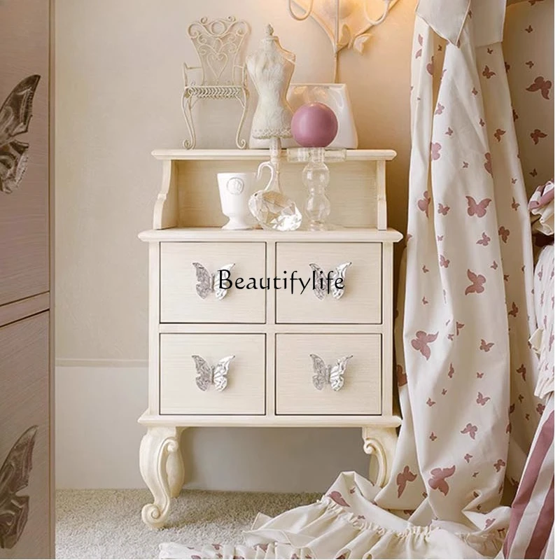 

Light luxury solid wood carved bedside cabinet, bedroom storage, bow handle cabinet