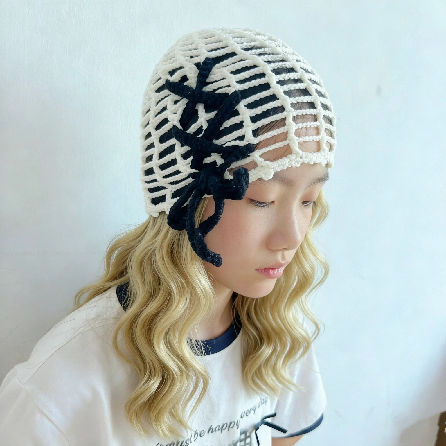 Handcrafted openwork knitted hat for women with bow, versatile knit beanie cap