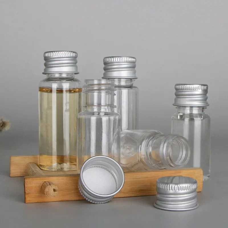 10 個 5 ミリリットル/8 ミリリットル/10 ミリリットル/15 ミリリットル/20 ミリリットル/30 ミリリットル卸売アルミキャッププラスチックボトルペット透明サンプルボトルエマルジョン化粧品ボトル