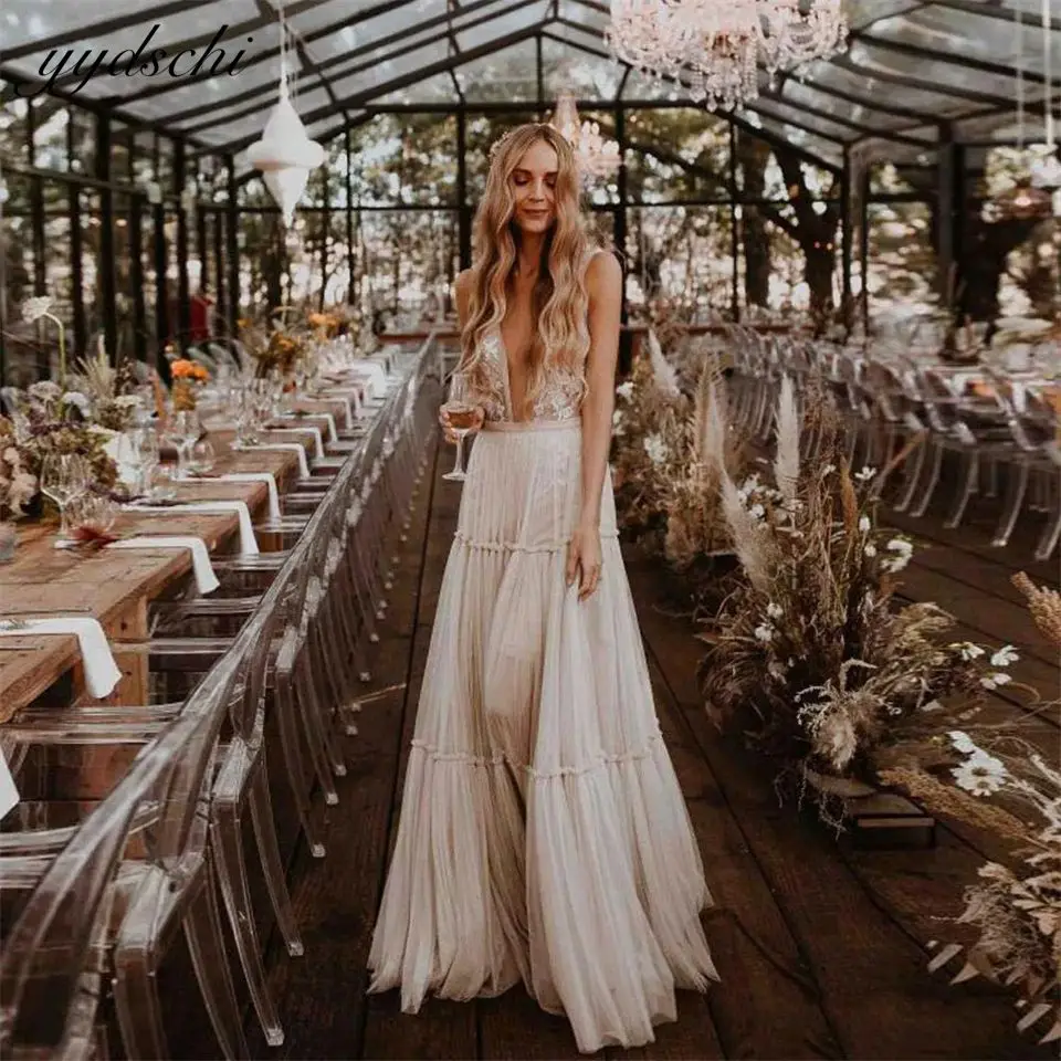 ชุดแต่งงานทรงเอไลน์แบบเซ็กซี่ปี 2025 คอทรงโอ ผ้าชีฟอง แต่งแอพพลิเค  แบบเปิดหลัง ไม่มีแขน ชายกระโปรงยาวลากพื้น  ผ้าโปร่งแสง