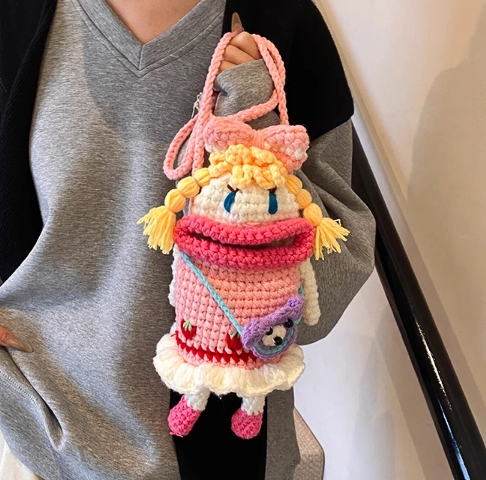 

Autumn and winter cute wool knitted bag 2025 new hand knitted cartoon big mouth girl mobile phone bag commuter crossbody bag