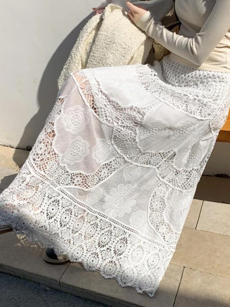 2025 novo no verão design de moda nicho damasco saias boêmio estilo férias cor sólida rendas gancho flor midi saia para mulher