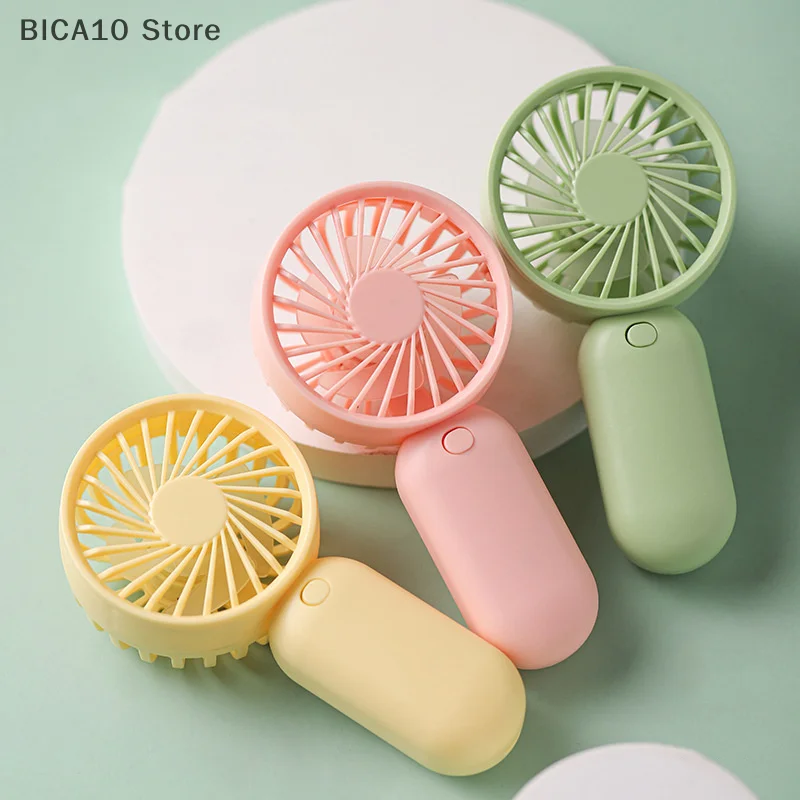 Colorful Portable Handheld Mini Fan AAA Battery Power Supply Mute Air Cooling Cooler For Summer Hot Trip Travel Home Office