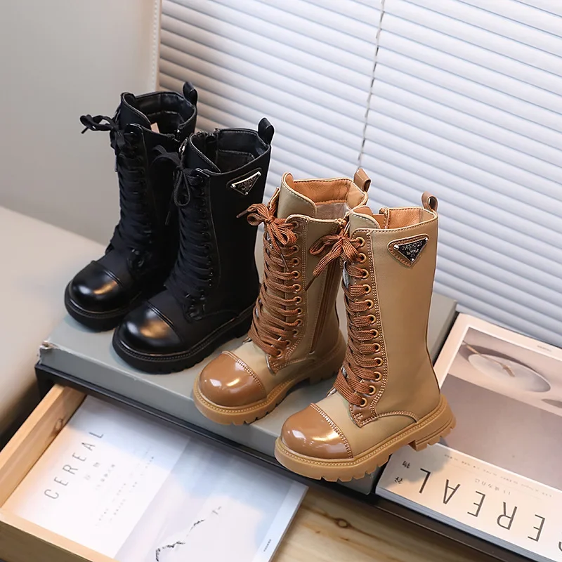 Botas de moda para chicas, otoño, nuevas botas altas y largas con correa cruzada para chico, zapatos para niños de Color sólido, botas de cuero de