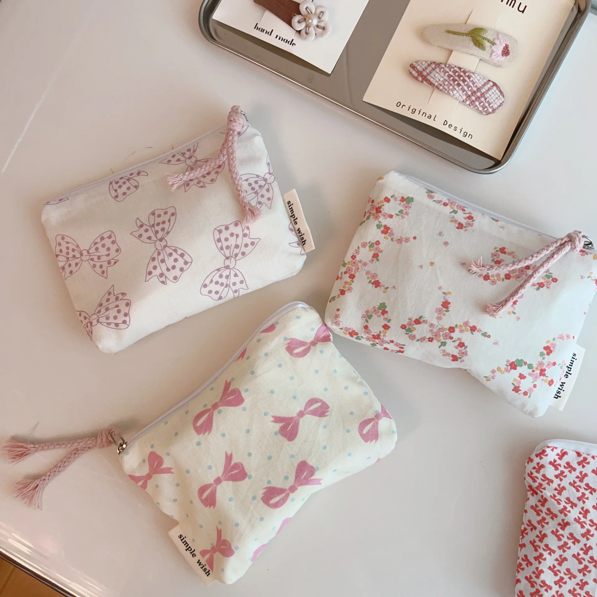 Elegante monedero con lazo, bolsa de maquillaje con lápiz labial floral, bolsa organizadora portátil de viaje, bolsa para tarjetas, auriculares, bolsa de almacenamiento para toallas sanitarias