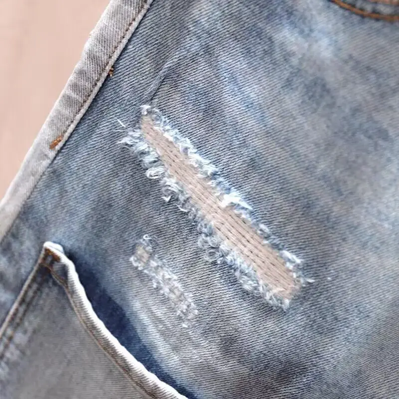Celana Jeans Pria Model Ripped Distressed Denim Washed Panjang Se-mata Kaki Model Pensil Sambungan Patchwork Skinny Berlubang Gaya High Street