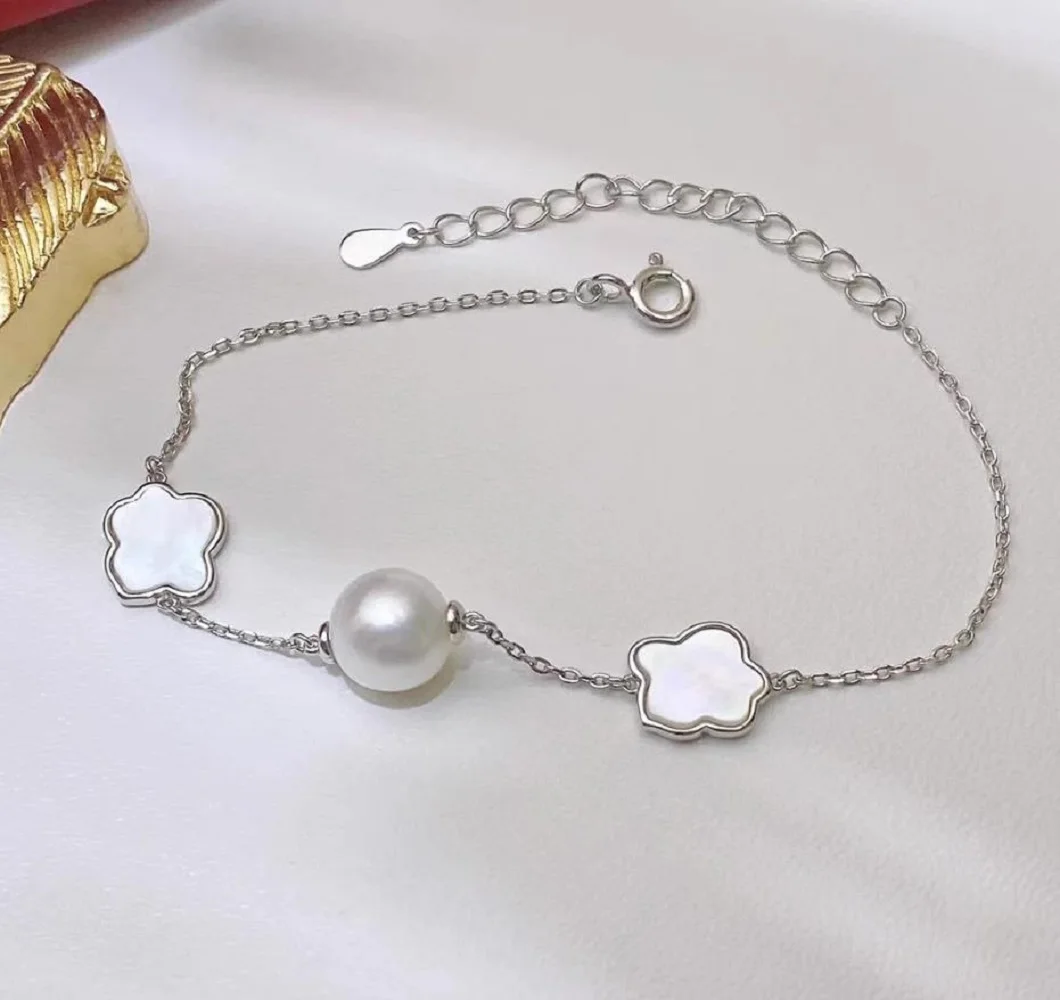 

Elegant Pearl Bracelet AAAA 10-11 mm Natural South Sea White Round Pearl Bracelet 925s