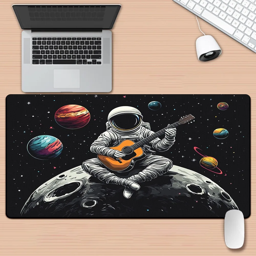 

XXL astronauts play guitar on the moon and planets. The mousepad is anti-slip and soft rubber making it an ideal choice for home