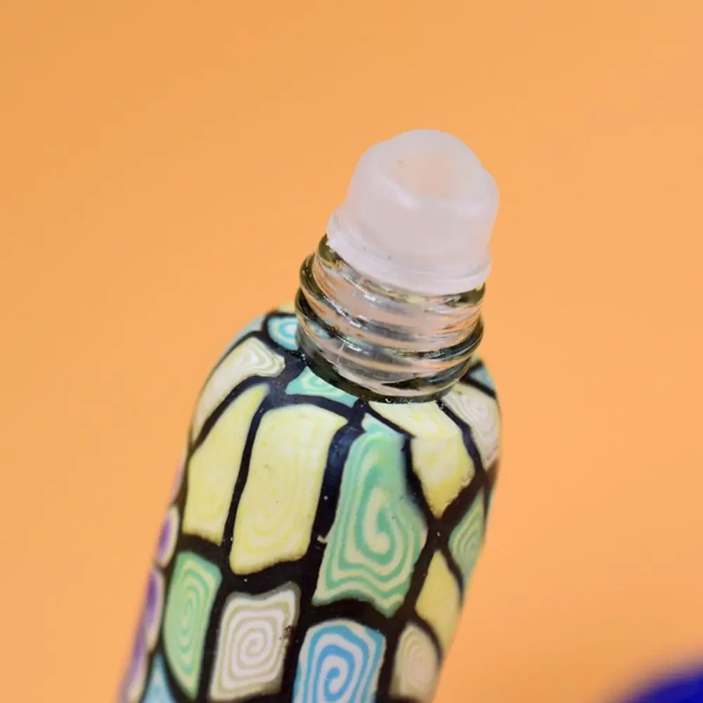 قارورة كروية دوارة بوليمر كلاي زجاجة دوارة زجاجة لفة زجاجية على زجاجات زجاجة كرة دوارة زجاجات دوارة للزيت العطري