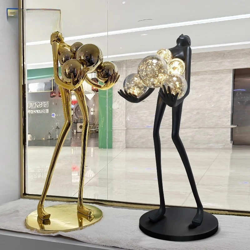 Nordic humanoid sculpture floor lamp, long arm ball design exhibition hall ornament, living room sofa lamp