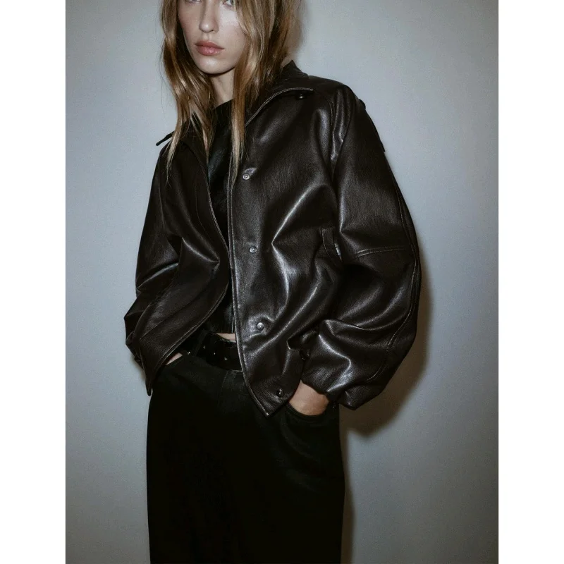 ファッショナブルなルーズスタンドカラーロングスリーブPUレザージャケット レディースアウター 秋冬新作 スタイリッシュなポリエステル繊維素材...