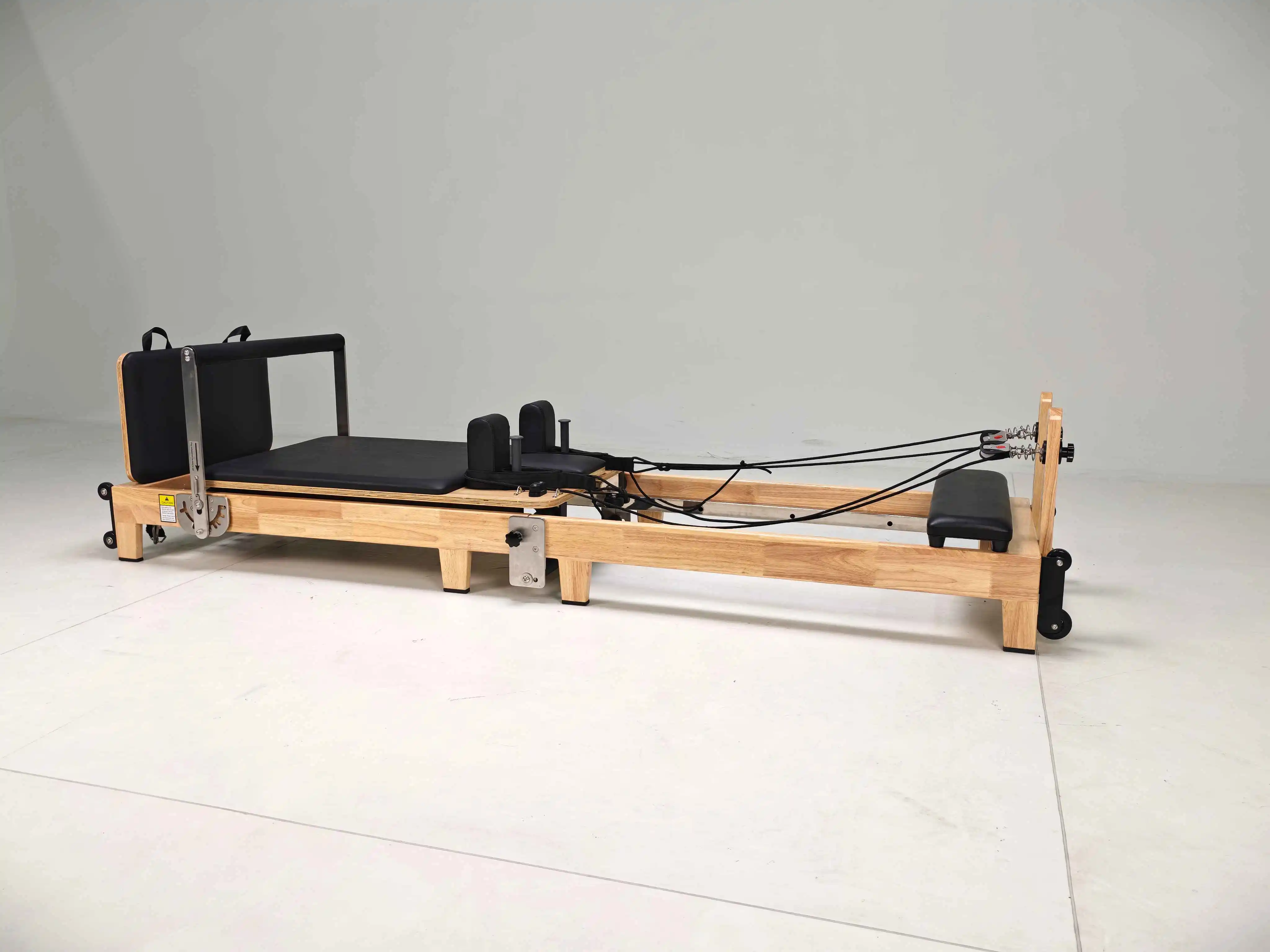 

Foldable Oak Pilates Reformer, Durable & Adjustable for Studio Use