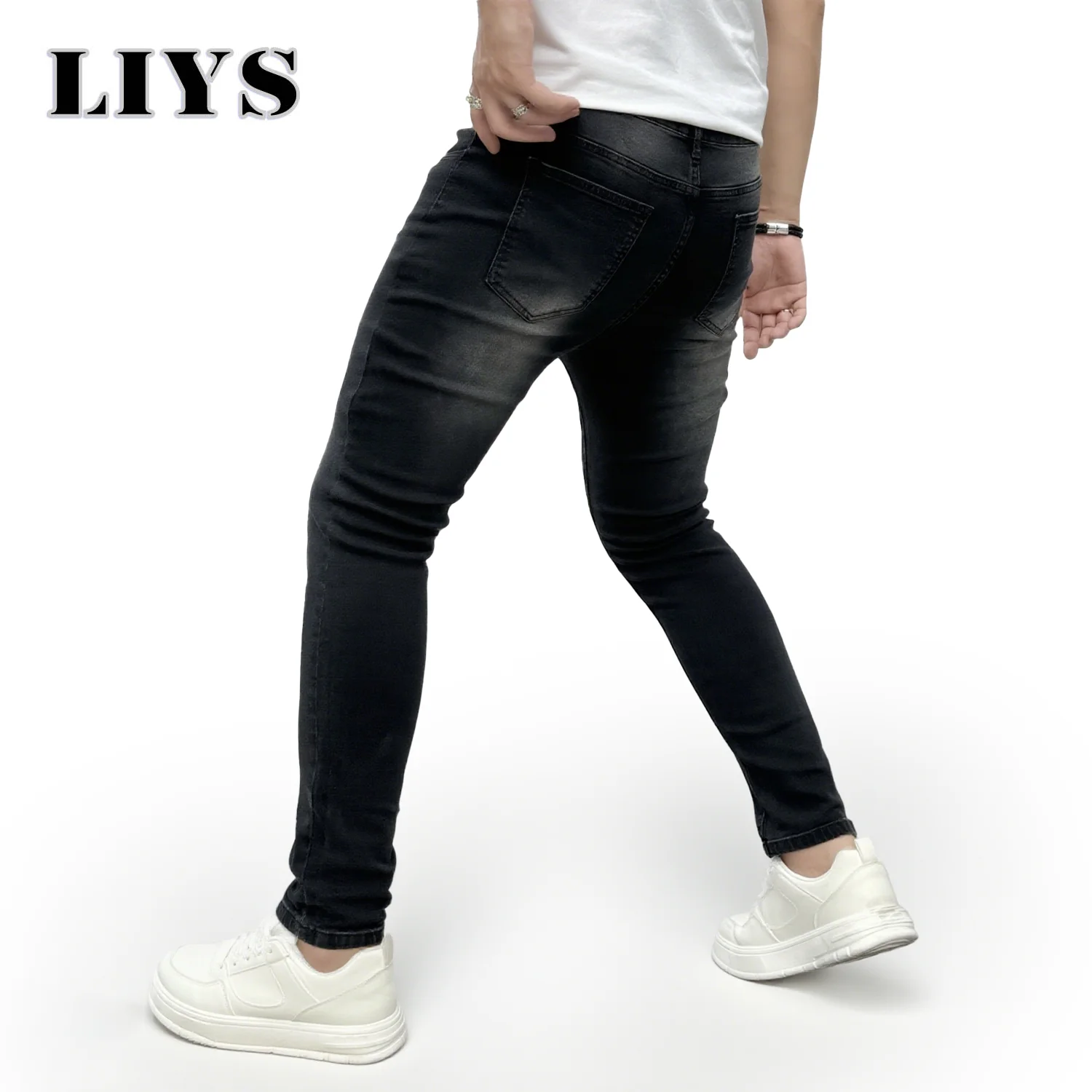 جينز ضيق للرجال في منتصف الليل من Summer Men's Jet Black Fade مع مقاس حضري أنيق مصمم للرجل الحديث المليء بمحور الموضة