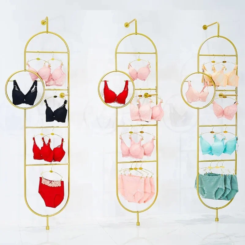 custom.Luxury Lingerie Store Display Furniture Design Stainless Steel Underwear Display Stand Wall Mounted Shiny Gold Bra Displa