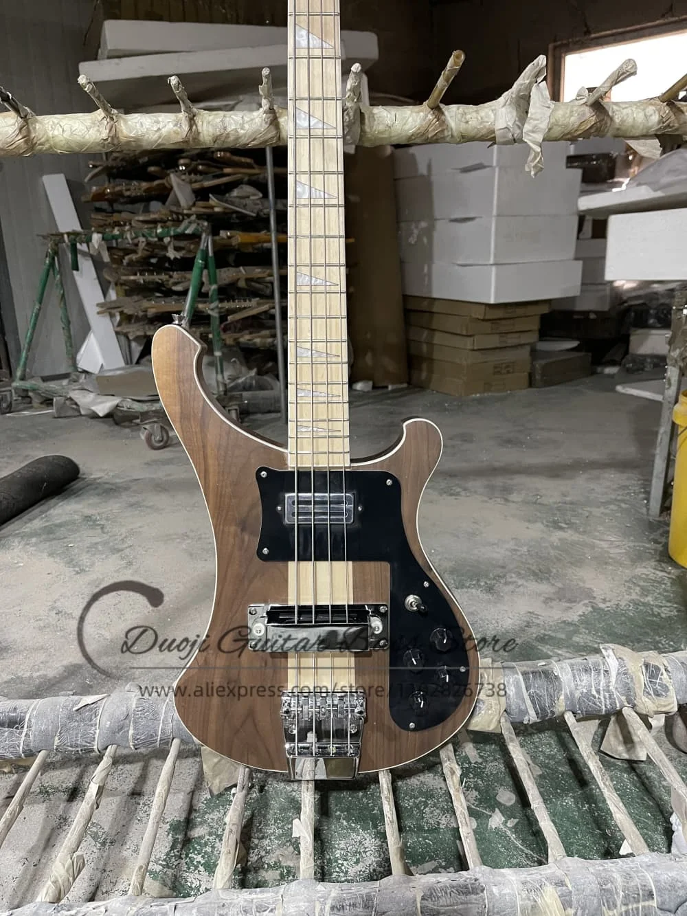 4 string walnut matte finish bass guitar, fixed bridge, maple neck through the solid body, black pickupguard Chrome hardware