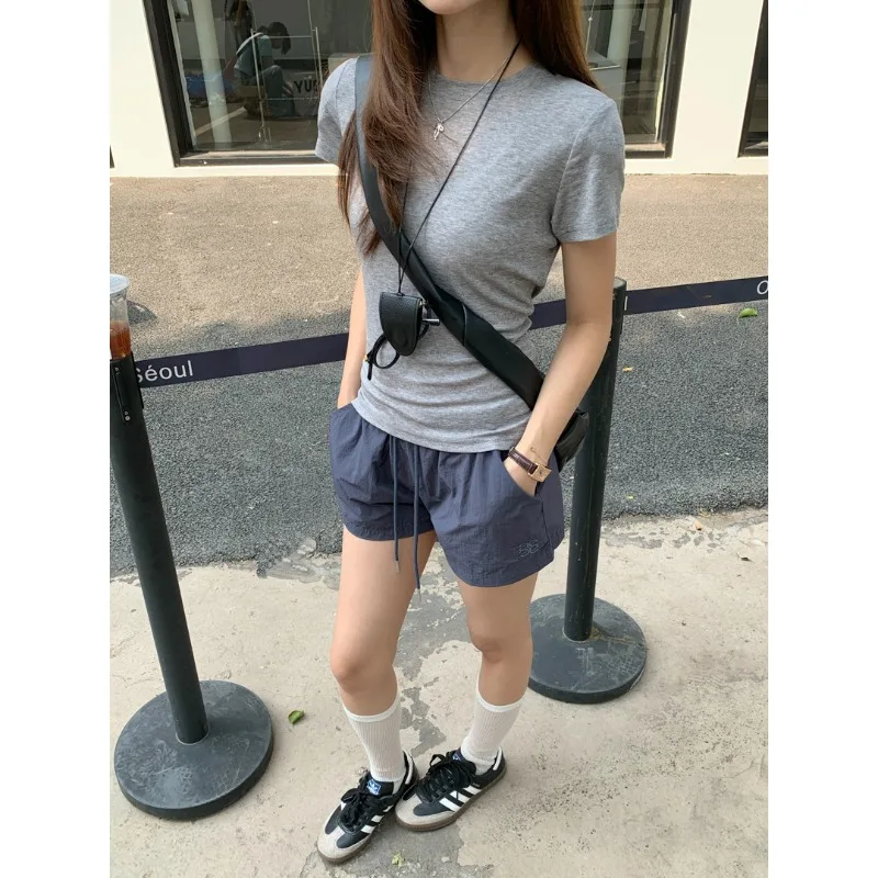 

Wool Regular Shoulder Short-sleeved T-shirt for Women Sweet and Cool Waist Tightening Sports Short Sleeved Top Spring