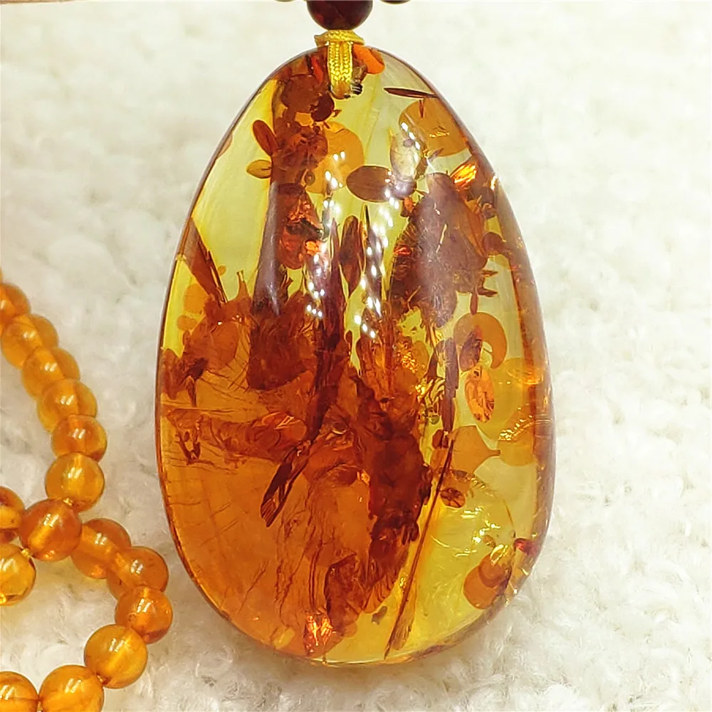 

Natural Piebald Amber Pendant Water Drop Yellow Amber 38x24x14mm Gemstone Pendant Necklace Jewelry AAAAA