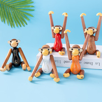 Creative cartoon simulation monkey phone holder, cute wooden inverted hanging monkey handicraft ornament, desktop gift