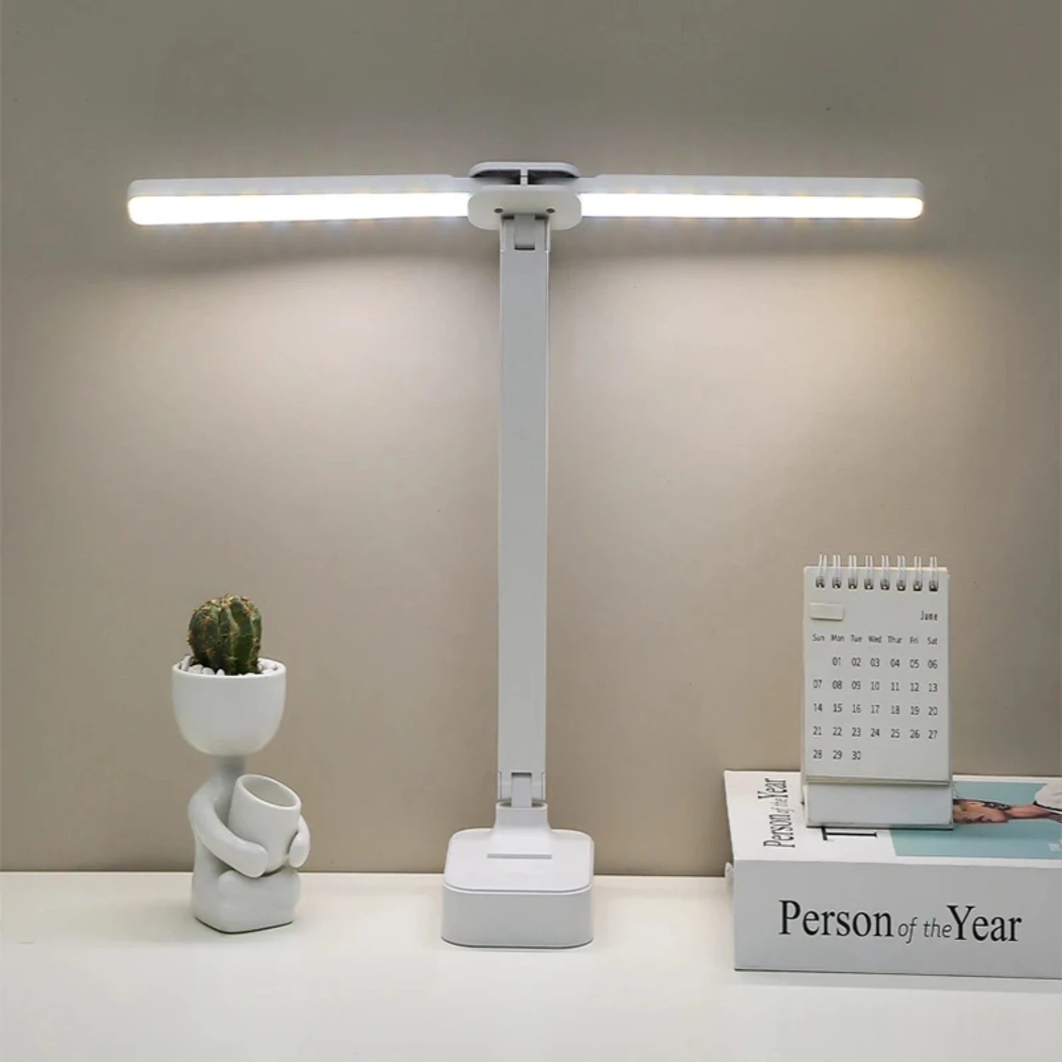 Portable, foldable, and convenient LED desk lamp with 3 dimmable brightness levels for eye protection in bedroom and office. Ver