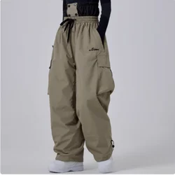 2025 uomo donna pantaloni da sci larghi impermeabili 15000 pantaloni da snowboard larghi antivento pantaloni da neve pantaloni Cargo da sci Hip-hop all'aperto