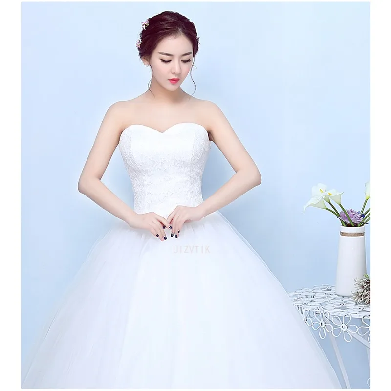 فستان زفاف أبيض بسيط بدون حمالات من الدانتيل بأربطة بطول الأرض فستان حفلة العروس الخفيف الفاخر خارج الكتف فستان حفلة الأميرة