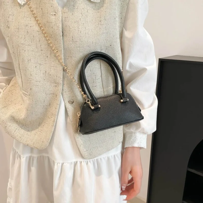 スタイリッシュなカジュアルおむつバッグ、ミニマリストヴィンテージレザートート、女性用大容量トレンディバックパックハンドバッグ