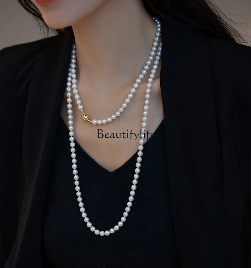 

New personality, fashionable temperament, multi-layer stacked magnetic buckle pearl long light luxury sweater chain