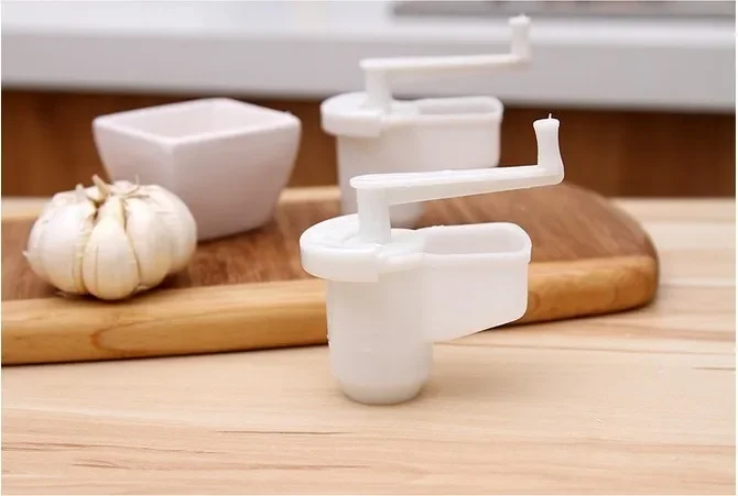 

Multifunctional Kitchen Gadget Tools Garlic Clasp Plastic Mill For Garlics Press Crusher Grinding Grater Rotate KB 1372