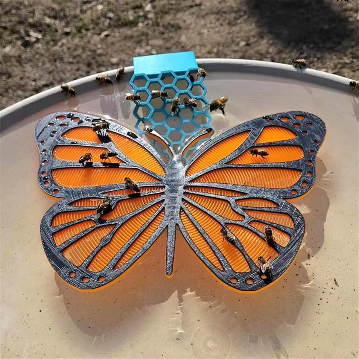 Y31A محطة سقي النحل متعددة الأغراض قابلة لإعادة الاستخدام على شكل فراشة مطرقة عائمة على شكل فراشات صينية حمام سقي النحل