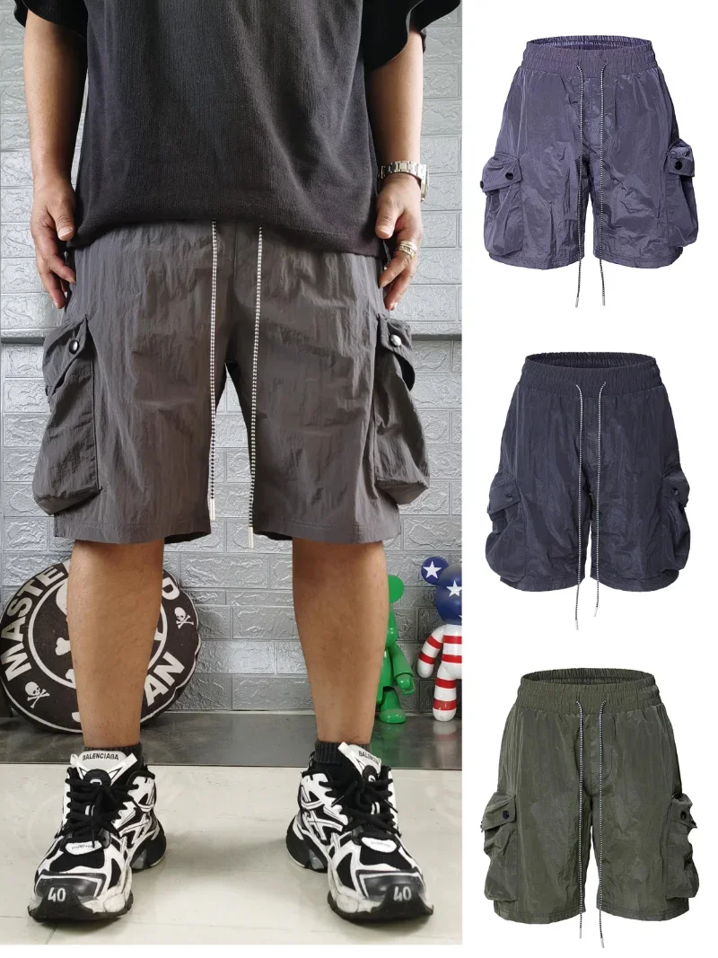 

23SS New Fasion Drawstring Large Pocket Drawstring Shorts Men Women High Quality Heavy Fabric Casual Shorts Tiny Spark