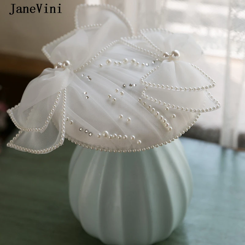 JaneVini 2022 Beaded Pearls Bride Hat White Bow Vintage Wedding Hats with Hairpins Luxury Church Evening Party Women Headdress