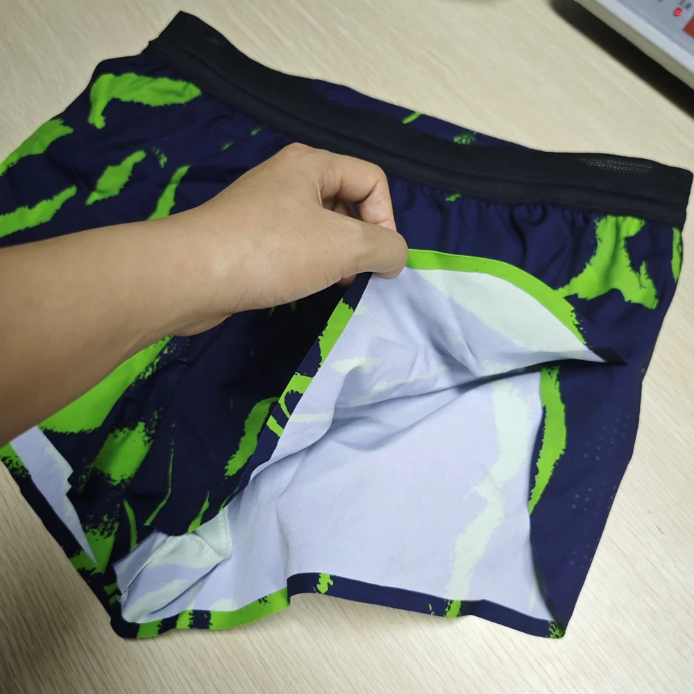 ..Sports running training quick-drying pressed rubber shorts summer sports three-point pants lined with zipper fanny packYYS61