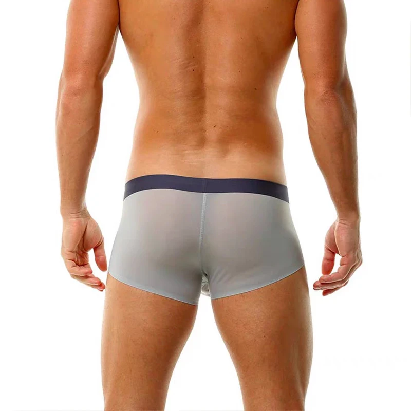 Bóxer ultrafino de secado rápido para hombre, ropa interior Sexy de seda de hielo, sin costuras, con bolsa de bulto en U, transpirable, novedad