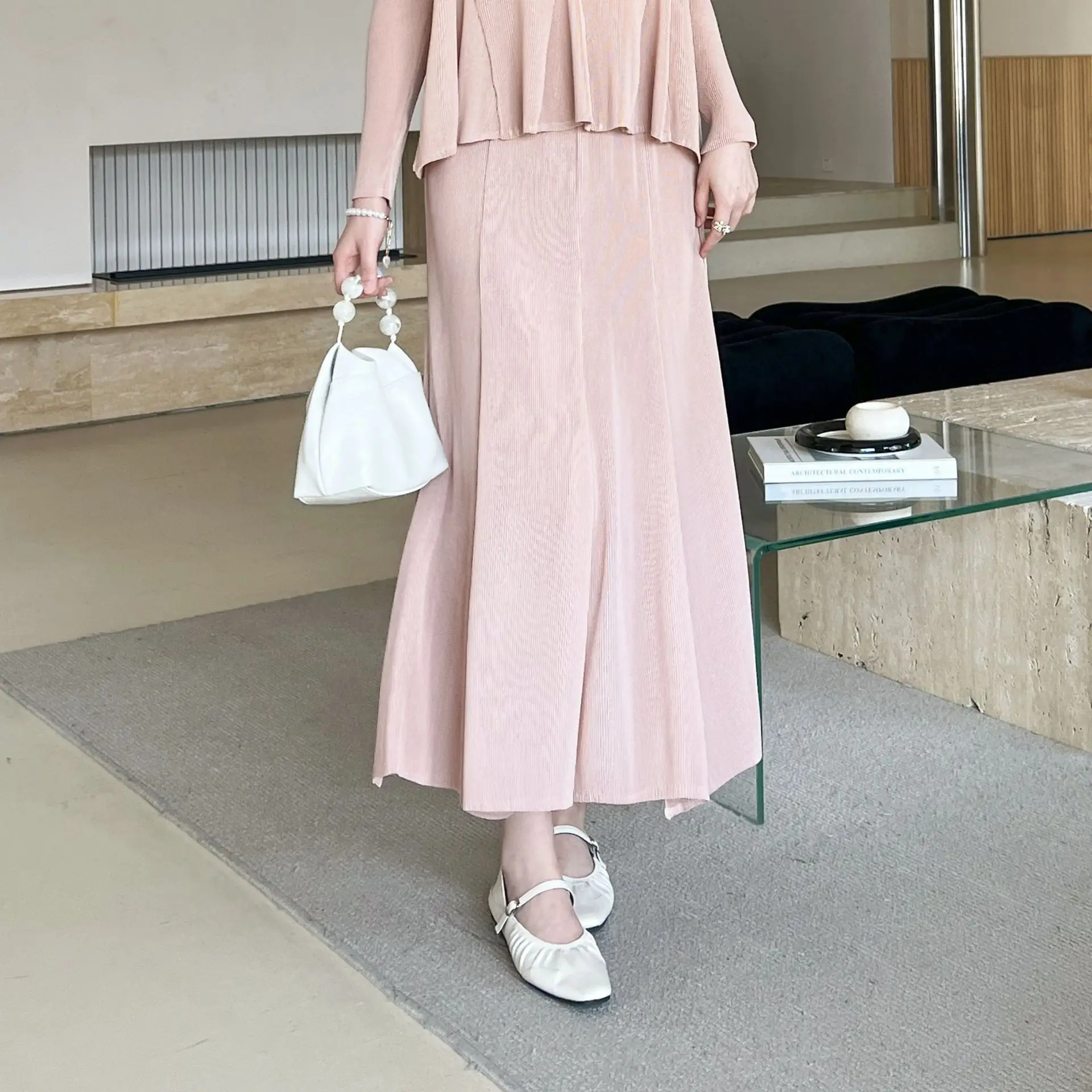 Miyake plisado 2026 otoño y primavera nueva ropa plisada de alta gama viajero cien con paquete falda de medio cuerpo de cola de pez a la cadera