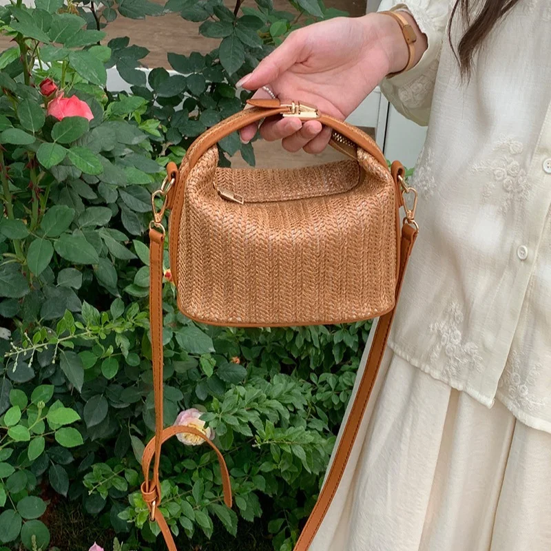 

Summer 2025 European and American grass woven small bags leisure women's bags holiday hand bill of lading shoulder crossbody bag