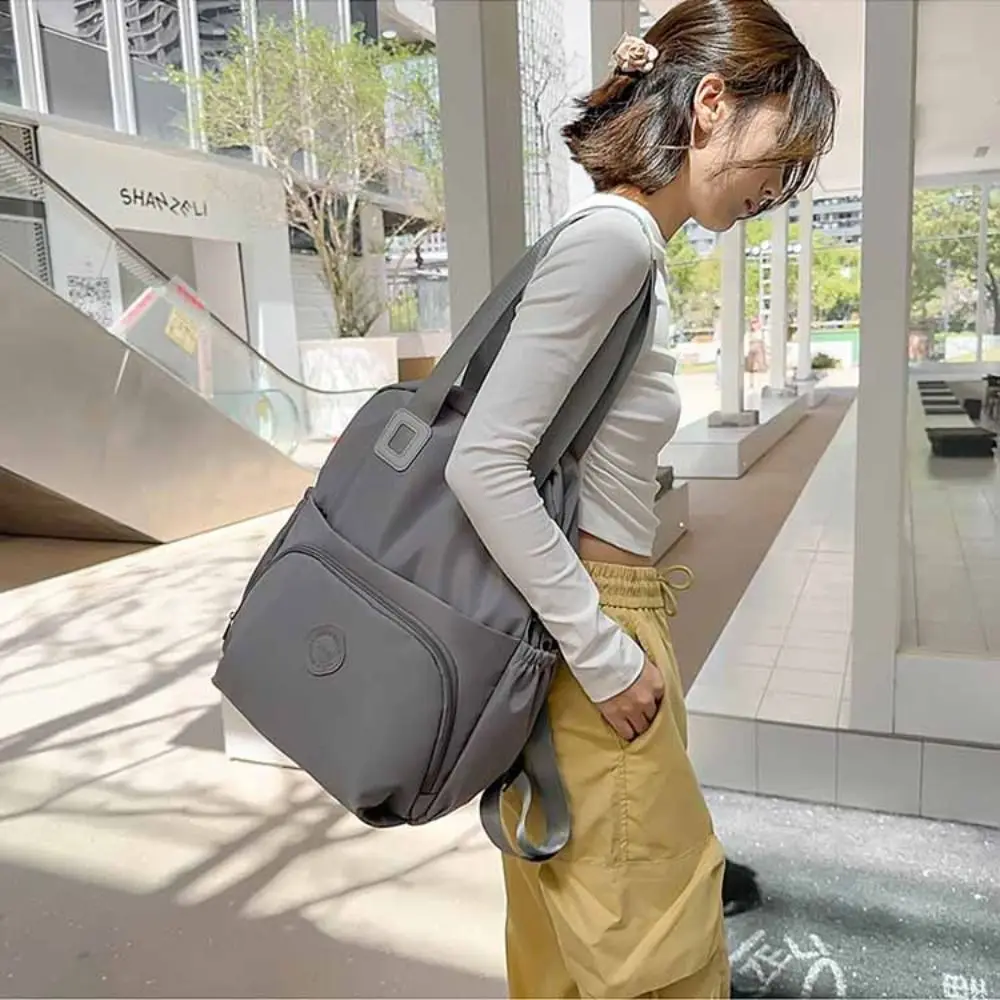 

Casual Korean Style Sport Nylon Backpack Solid Color Nylon Travel Shoulder Bag Large Capacity Niche Design Fitness Bag Travel