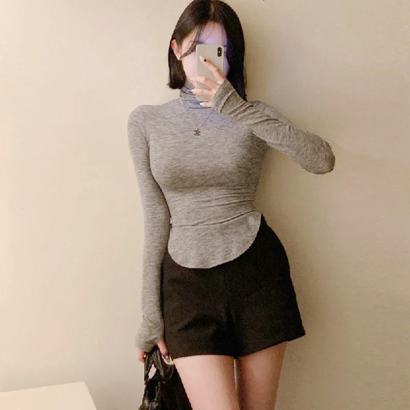 

Autumn/winter Korean Version New High Neck Long Sleeve Pullover Women Curved Cinching Waist Solid Slim Knitted Top F353