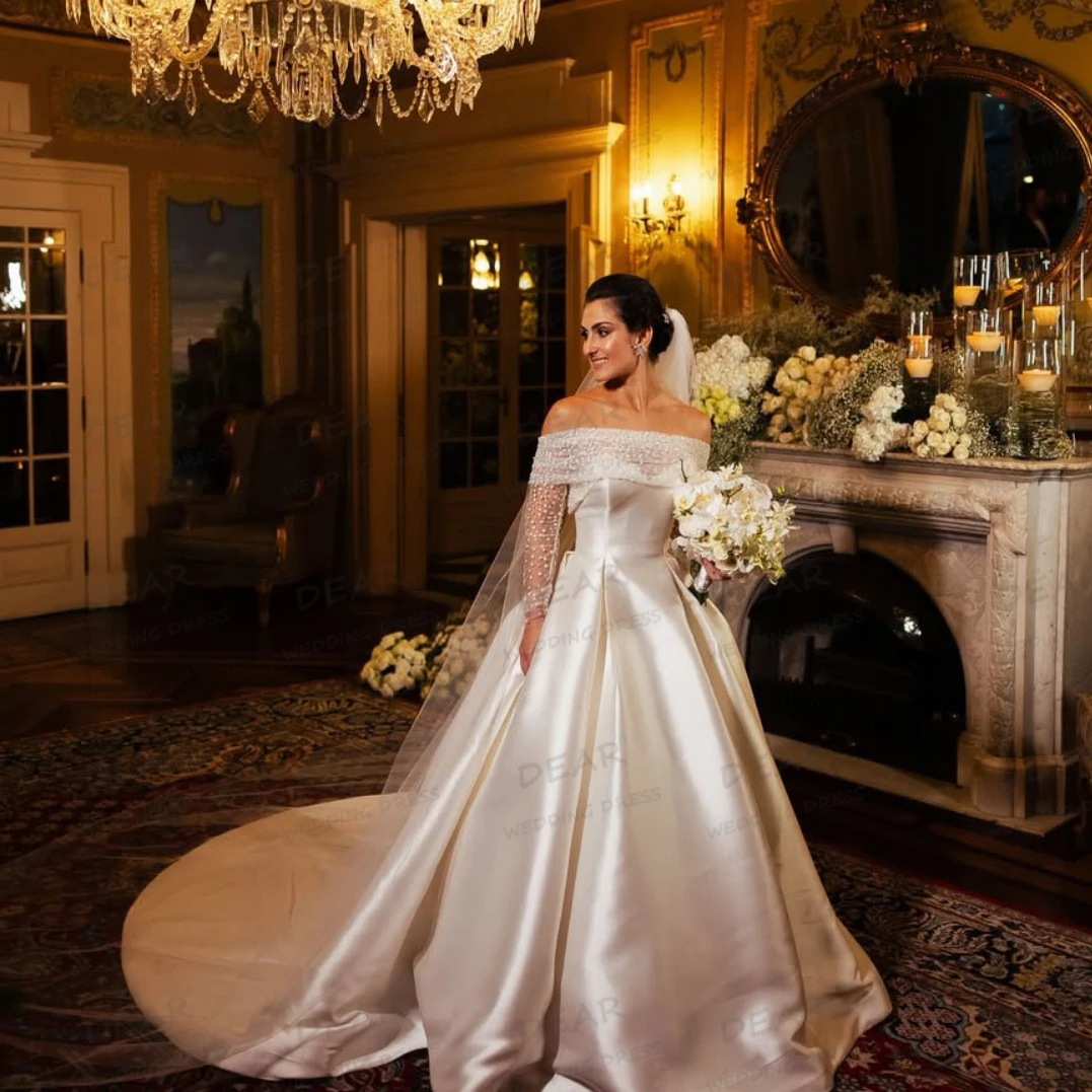 高級 A ラインのウェディングドレスの女性のセクシーなスパンコールオフショルダー長袖ブライダルドレス Vestidos デノビアフォーマルカスタマイズ