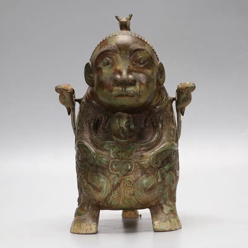 

Bronze antique ornaments, bronze human face lifting beam, divine face, antique bronze wine vessels, antique collectibles