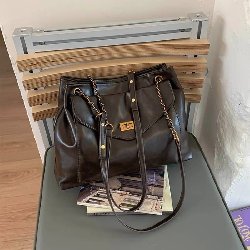 

Ladies Crossbody-Bag In Soft Leather, Adjustable Strap And Compact Size, By Luxury Brand, Perfect For Hands-Free Comfort