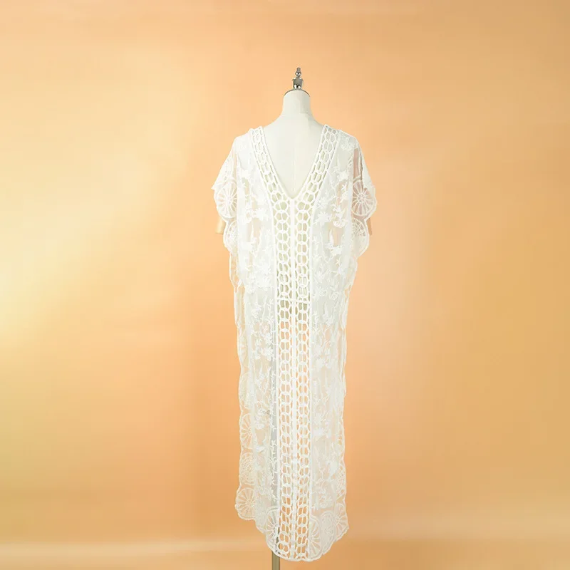2024 Blusa de playa Vestido de playa con protección solar y bata de encaje hueco de ganchillo para mujer