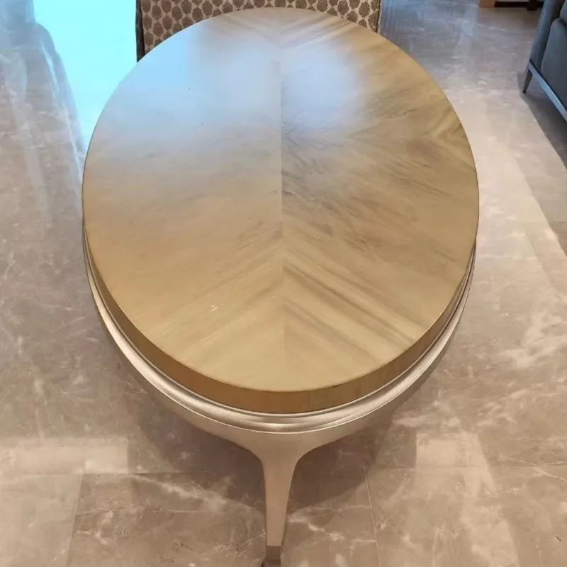 

American modern American light luxury solid wood oval champagne gold coffee table coffee table curved feet