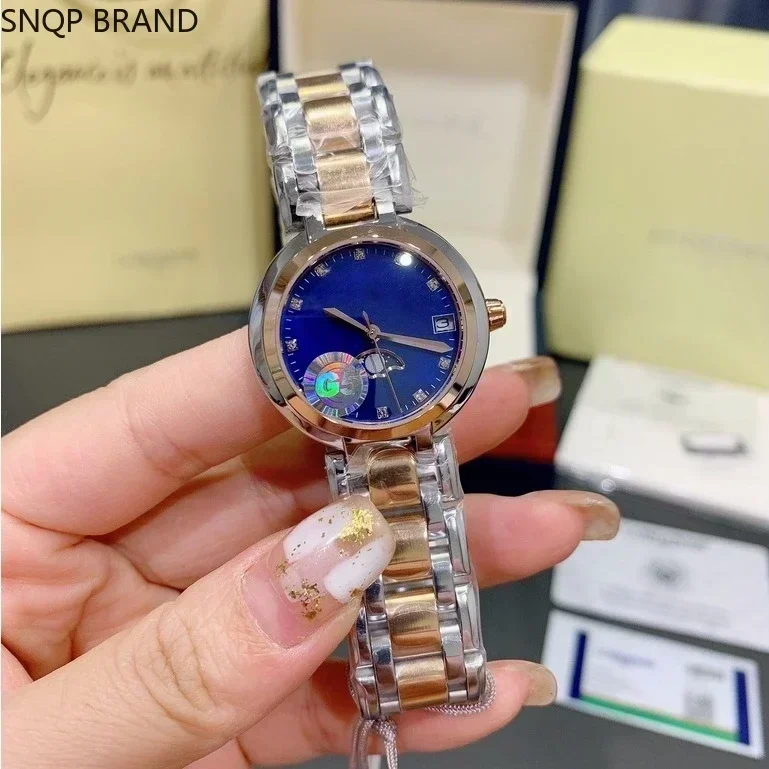 Nuevo reloj de lujo de cuarzo con forma de corazón y Luna para mujer, reloj azul de acero y oro rosa para mujer, reloj Masculino