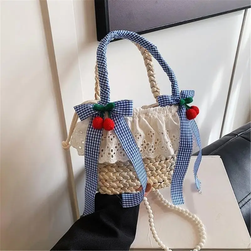 

X7XC Elegant Bowknot Woven Straw Beach Handbag Ruffle Lace Pearl Chain Small Crossbody Bucket Bag for Travel Holiday
