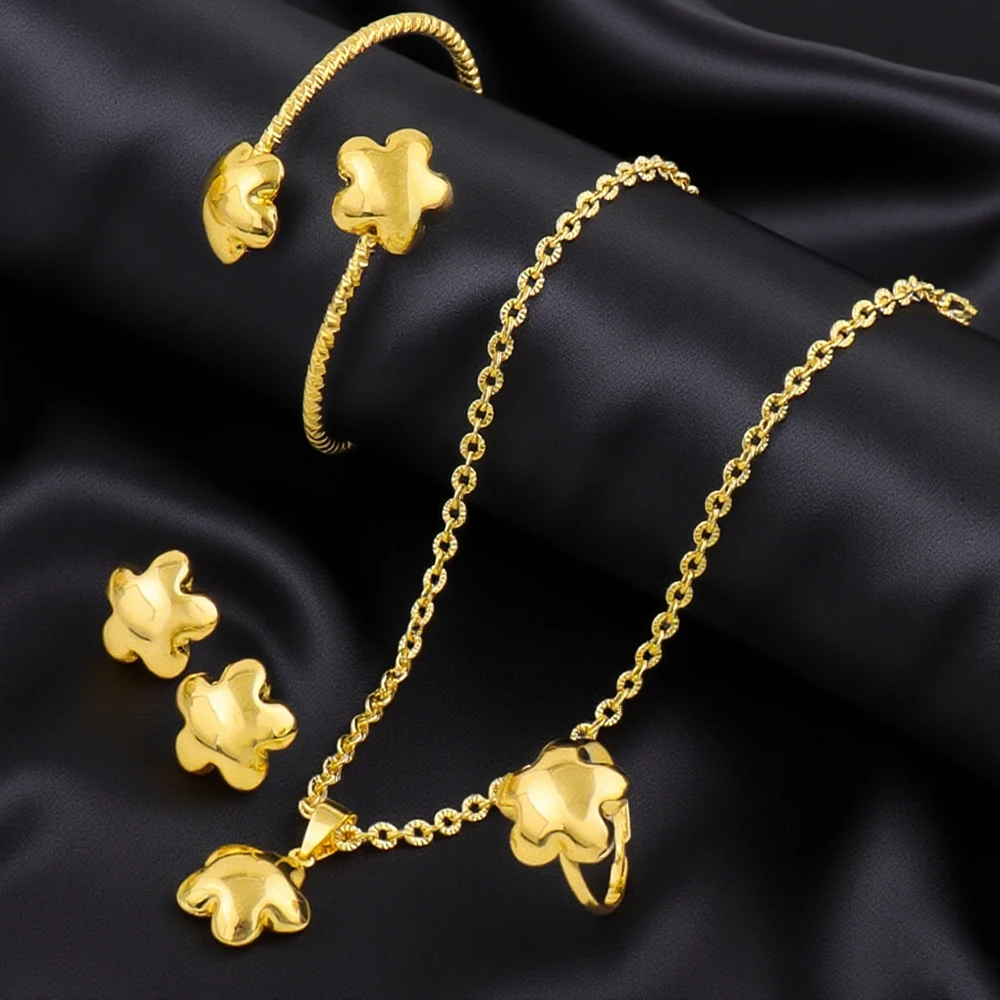 

4Pcs Gold-Plated Flower Necklace Earrings Bracelet Ring Jewelry Set For Woman America Fashion Party Stainless Steel Jewelry Gift