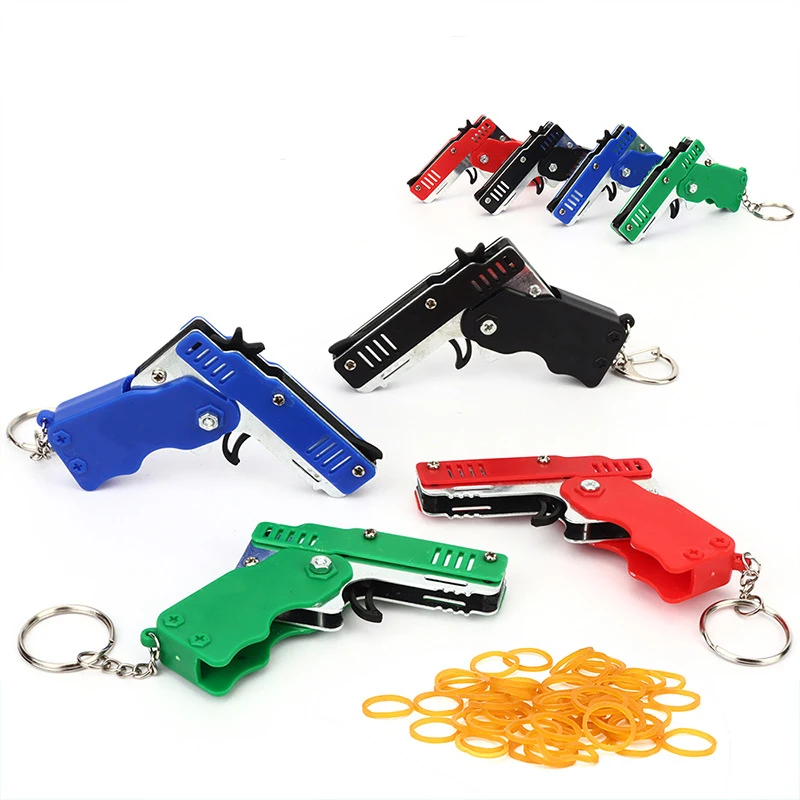 1 pçs mini chaveiro arma de borracha banda arma de brinquedo pistola de tiro liga criança festa ao ar livre dobrável arma de metal presente do