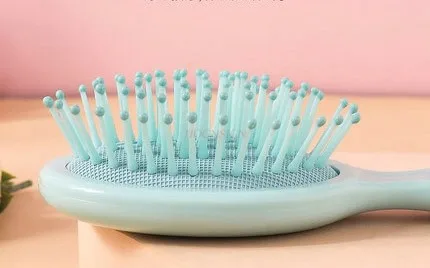 

Mini air-cushion airbag comb small portable portable baby child girl trumpet massage hair loss prevention