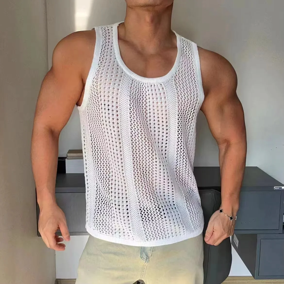 

New Man Hollow Out Tank Top Sexy Sleeveless Breathable Knit Camisole Loose muscles Fitness Bar Singer Dancer Performance Vest