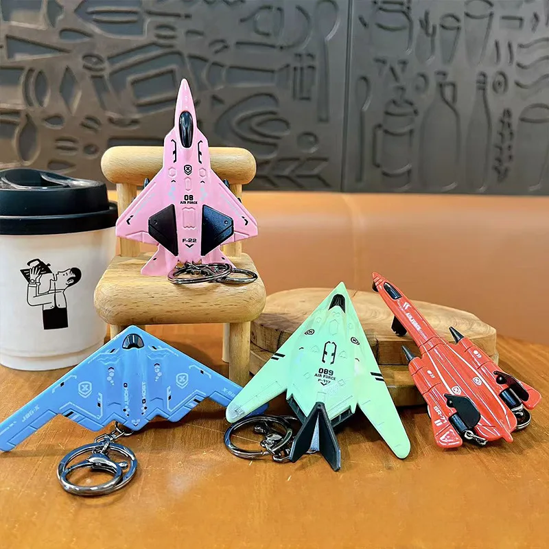 Mini avión de aleación creativa/juguete de combate, llavero modelo para niños, regalo de luchador para niños, colgante de avión pequeño de inercia